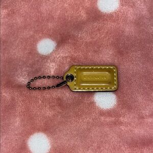 Coach Mustard Yellow Small Patented Leather Bag Hang Tag